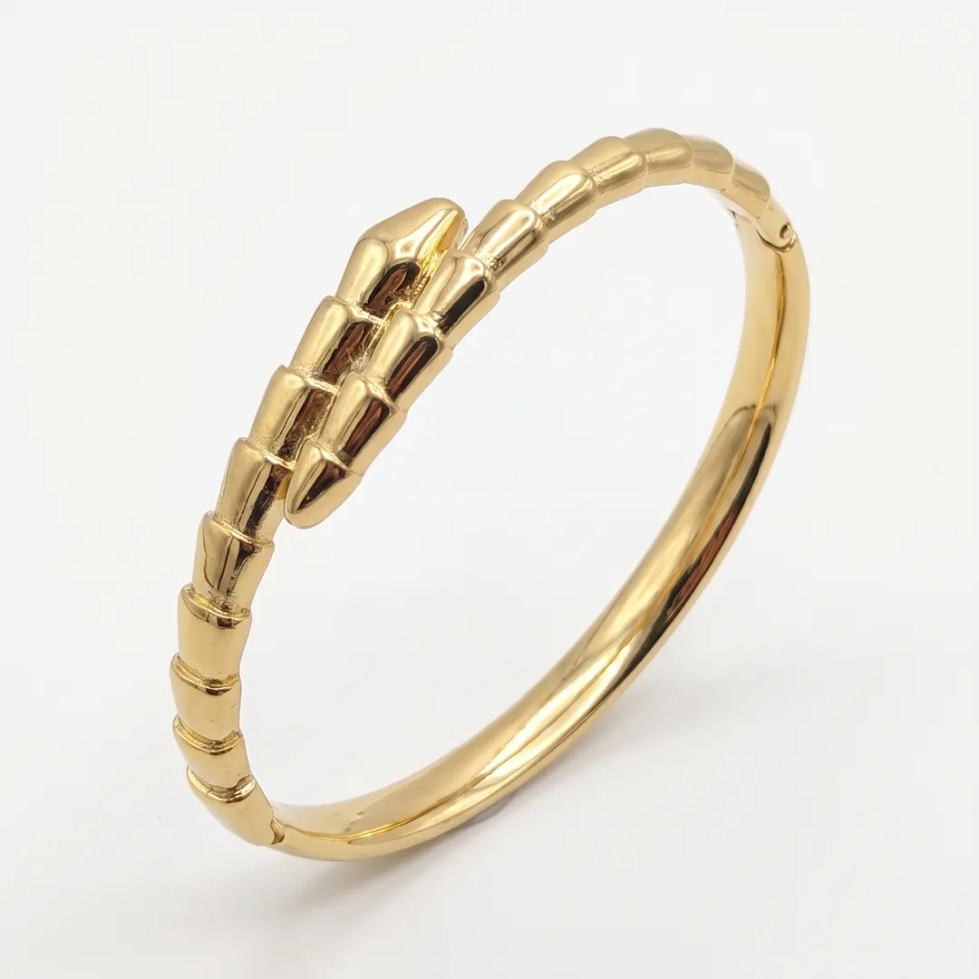 Brazalete rígido de acero dorado, diseño serpiente de cascabel, Serpiente dorado, foto 1