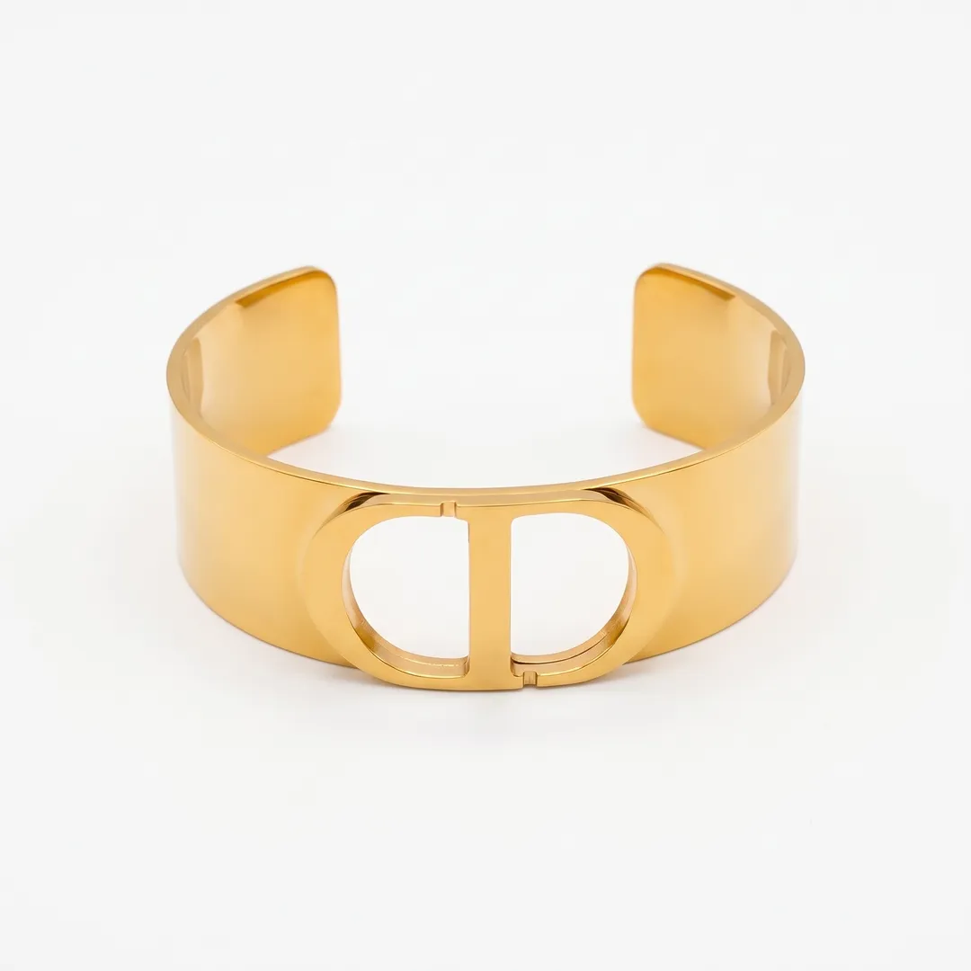 Brazalete rígido de acero, diseño serpiente de cascabel, CD dorado, foto 1