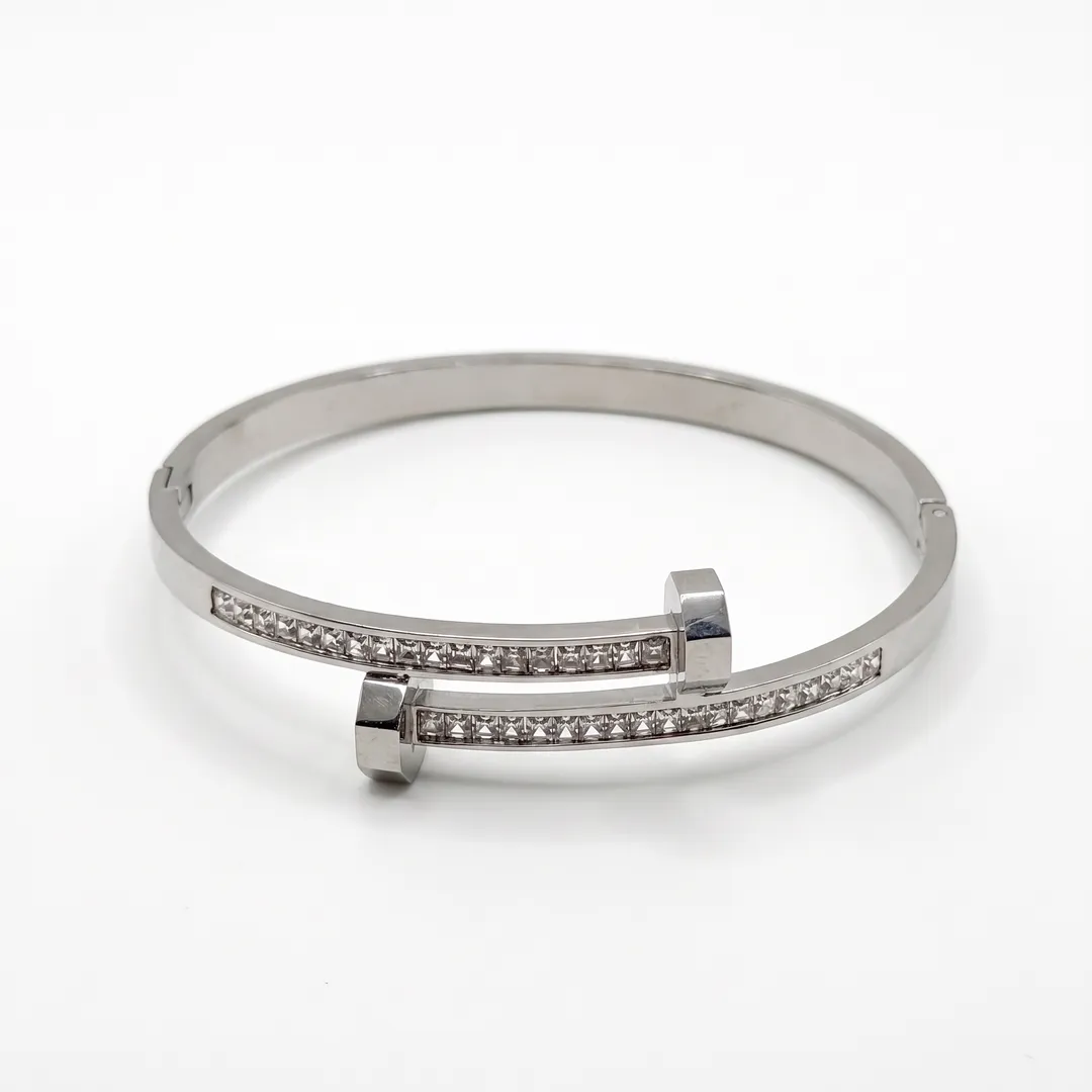 Brazalete rígido de acero, diseño serpiente de cascabel, Uñas acero, foto 1
